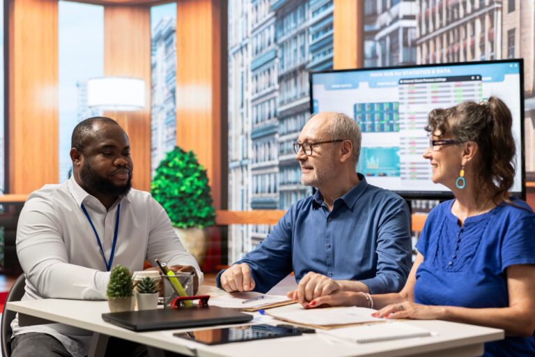 Mature couple consulting a financial planner about their retirement strategy